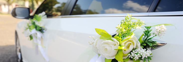 wedding car with flowers